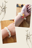White Bead Bracelet with Cowrie