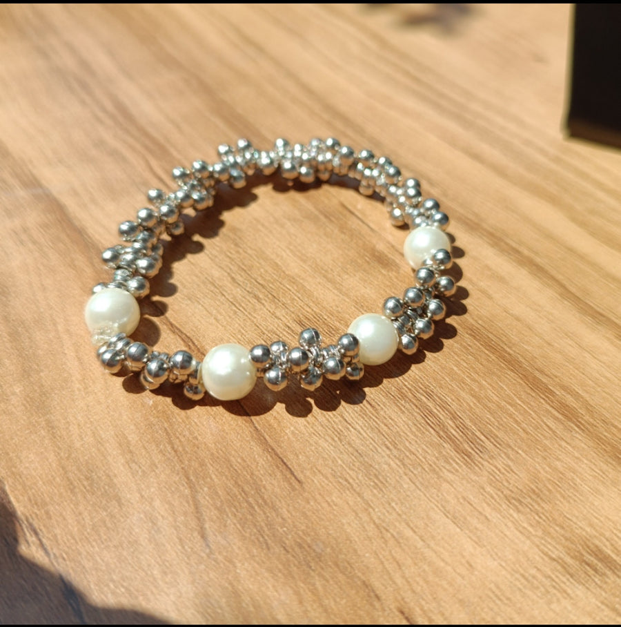 Bracelets with white beads