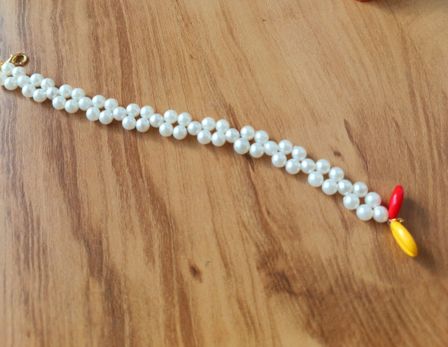 White Bead Bracelet with Cowrie